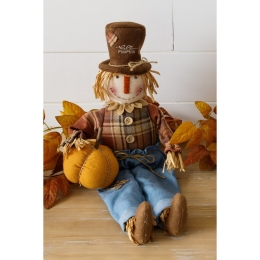 Scarecrow Sitter Holding Pumpkin